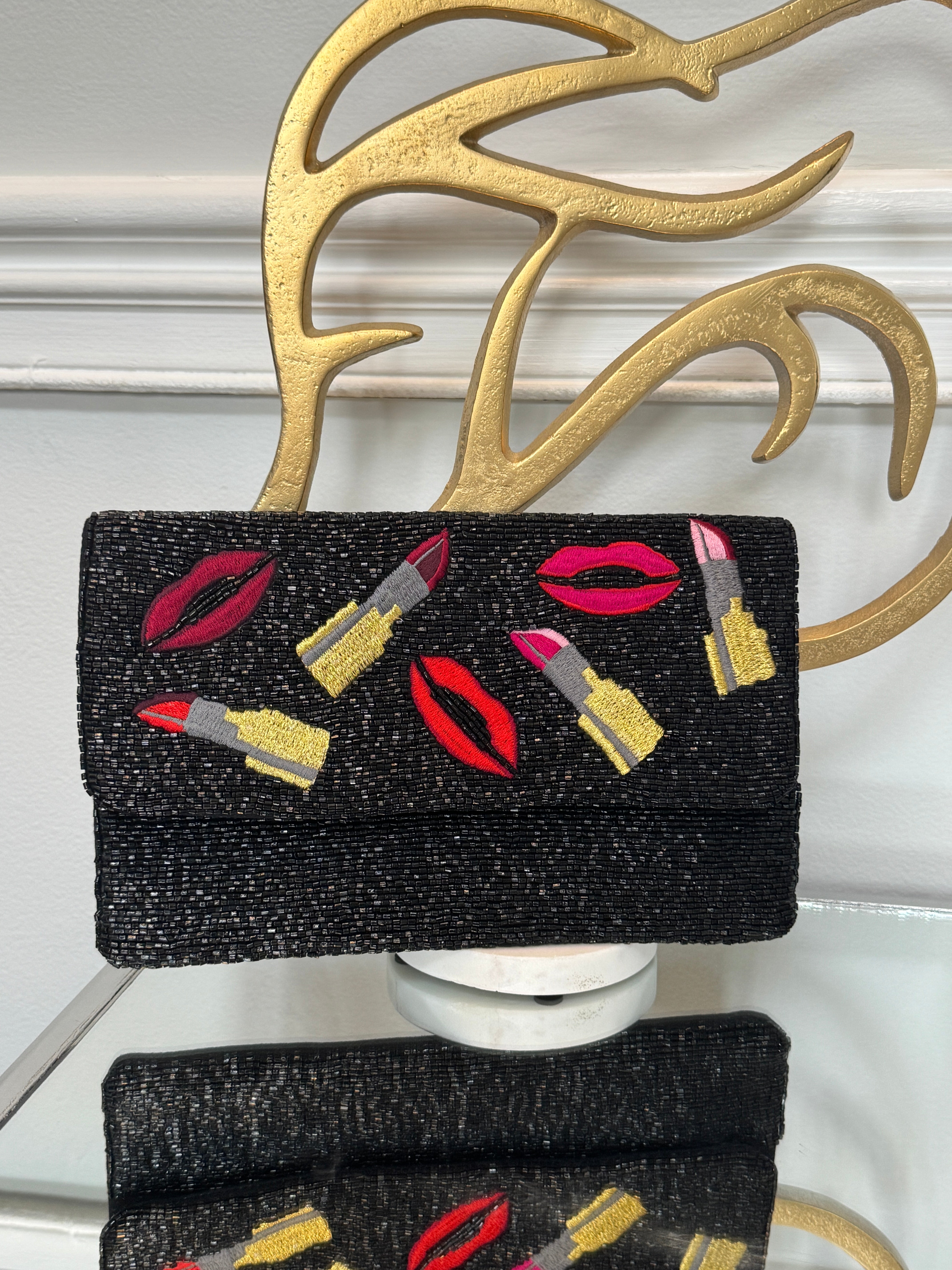 Black beaded & colored embroidery design clutch.