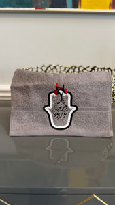 Hand towel designed with Arabic Calligraphy يا هلا ومرحبا نورتونا & Fatimah’s hand