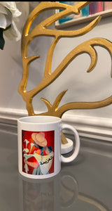 White mug designed with a powerful women image and Arabic Caligraphy العزيمة