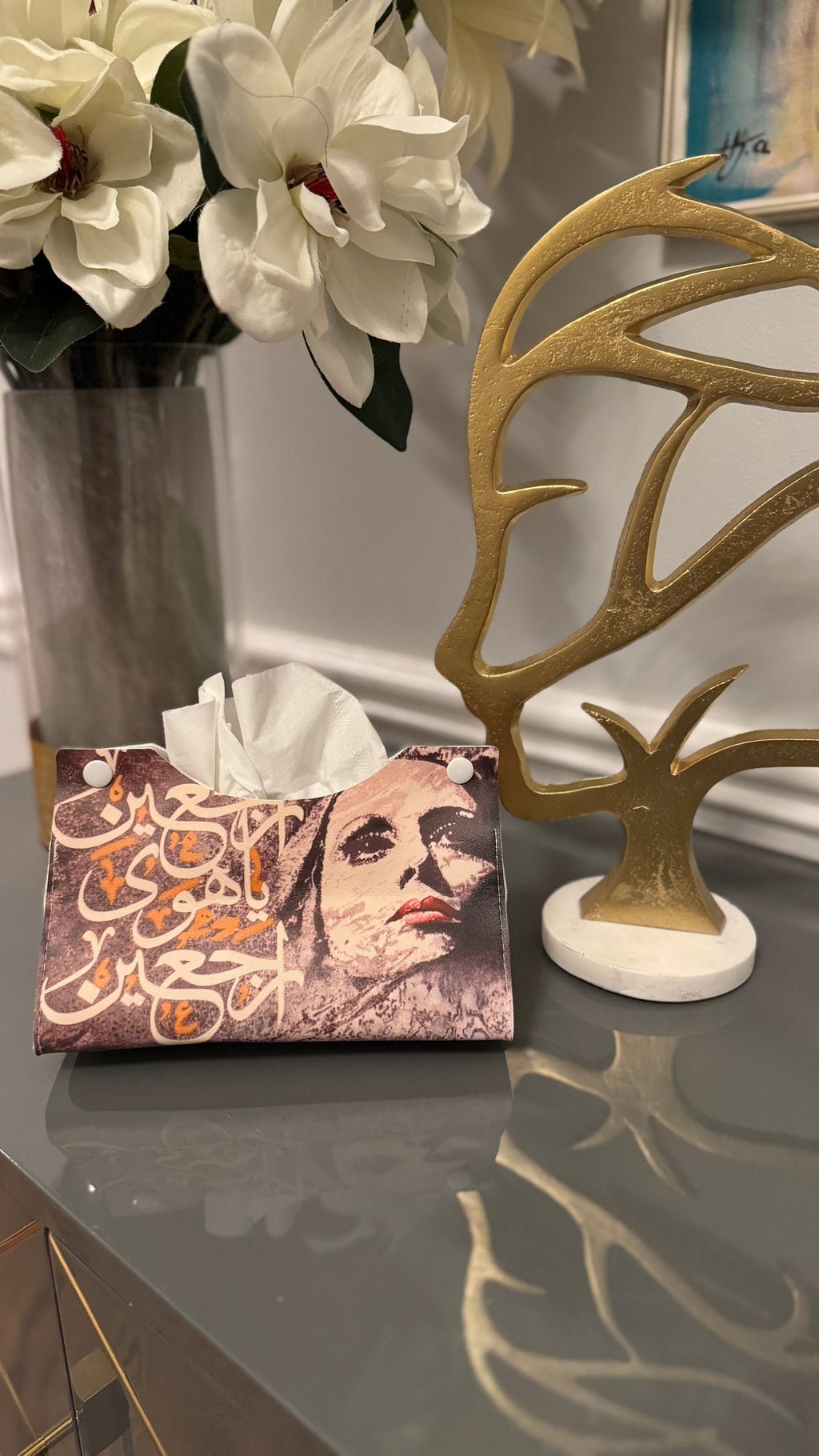 Tissue box cover designed with Arabic Calligraphy راجعين يا هوا راجعين