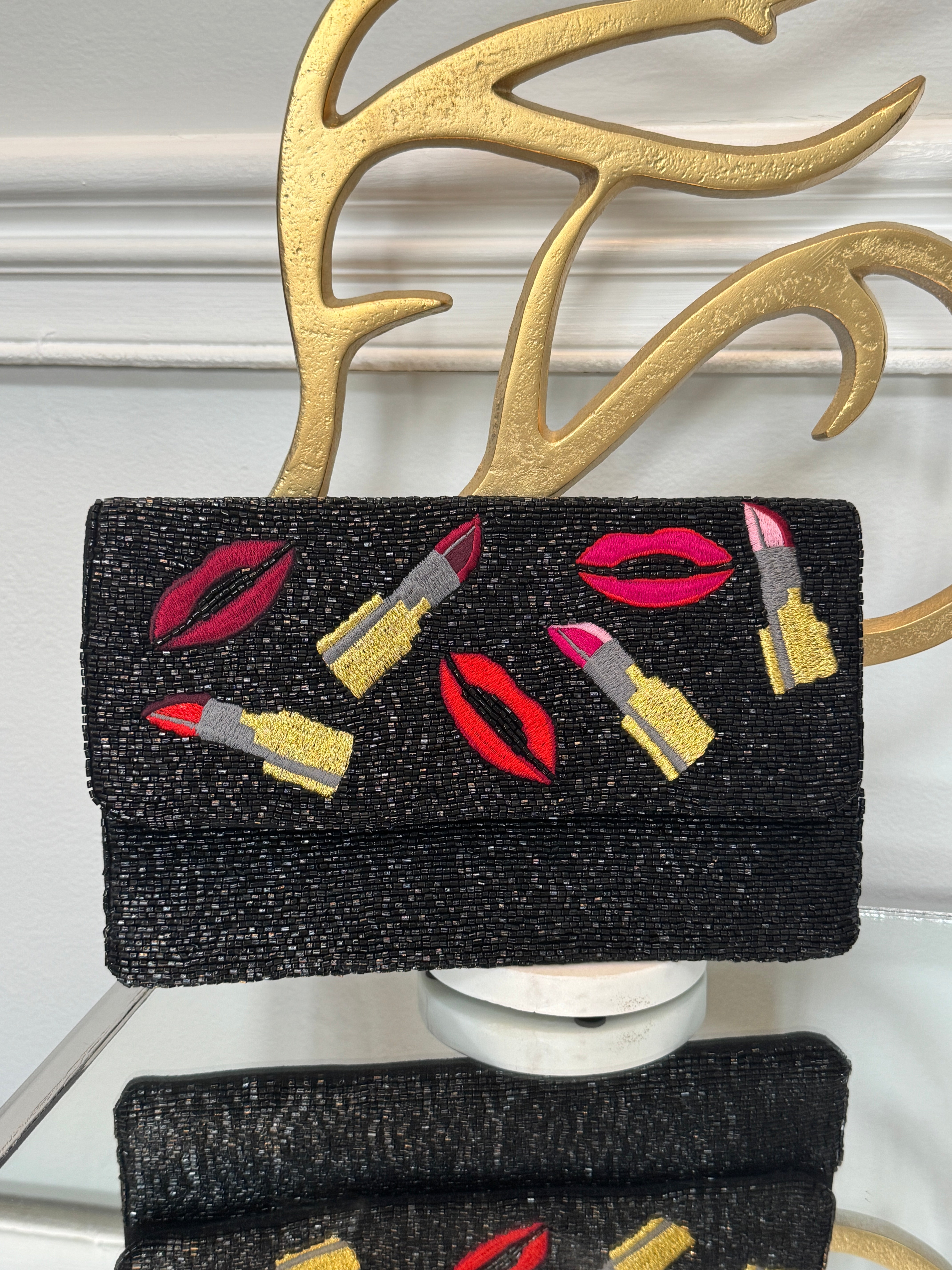 Black beaded & colored embroidery design clutch.