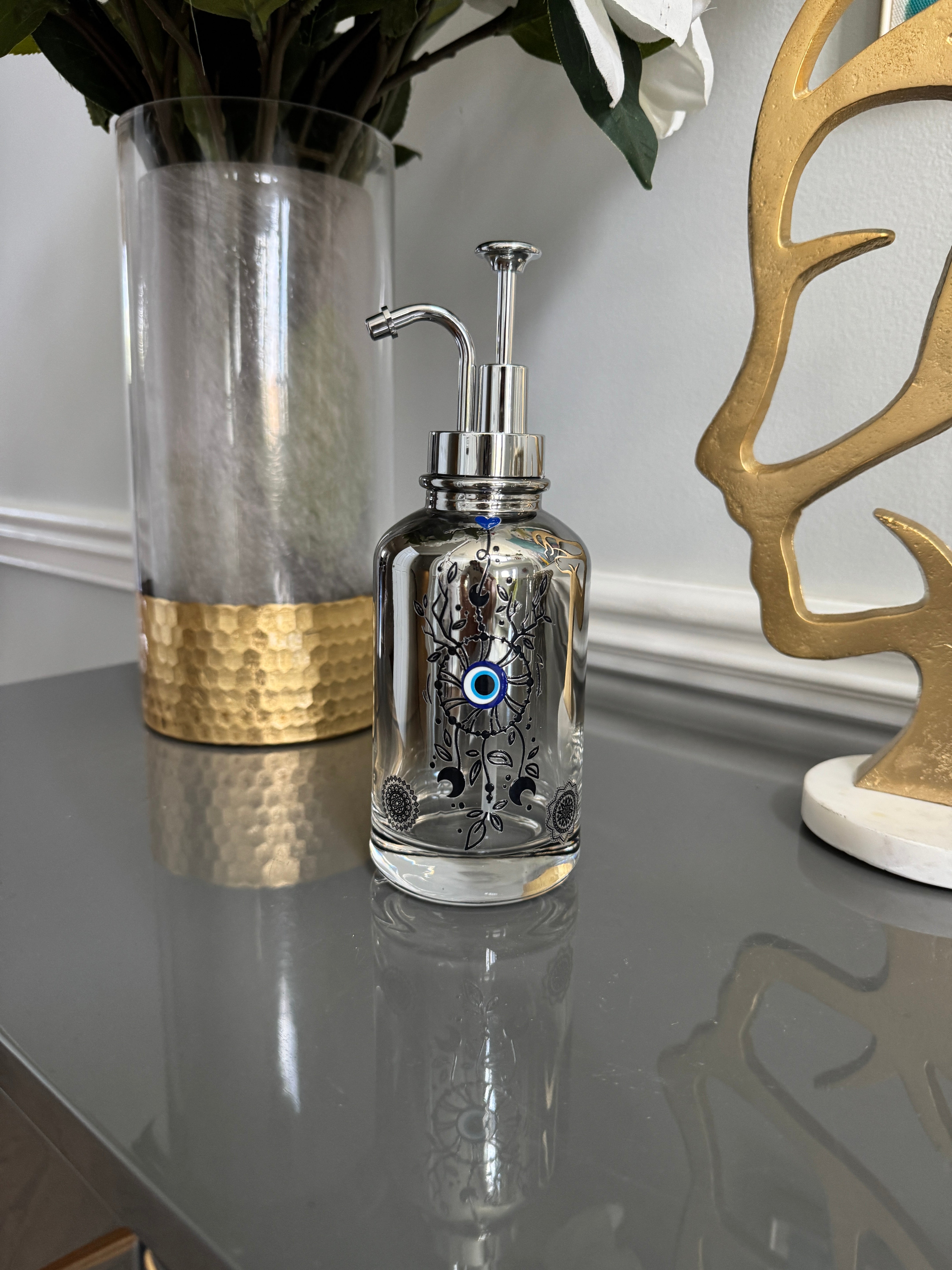 Clear Grayish Glass & Silver Soap Dispenser designed with evil eye 🧿 motif.