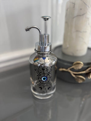 Clear Grayish Glass & Silver Soap Dispenser designed with evil eye 🧿 motif.