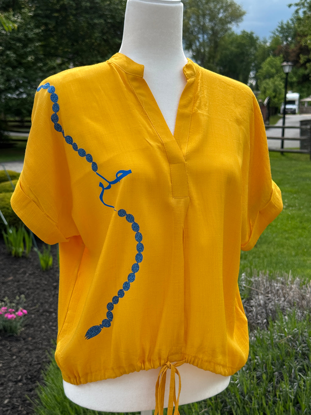 Yellow Blouse with Art and Arabic calligraphy design. حلم