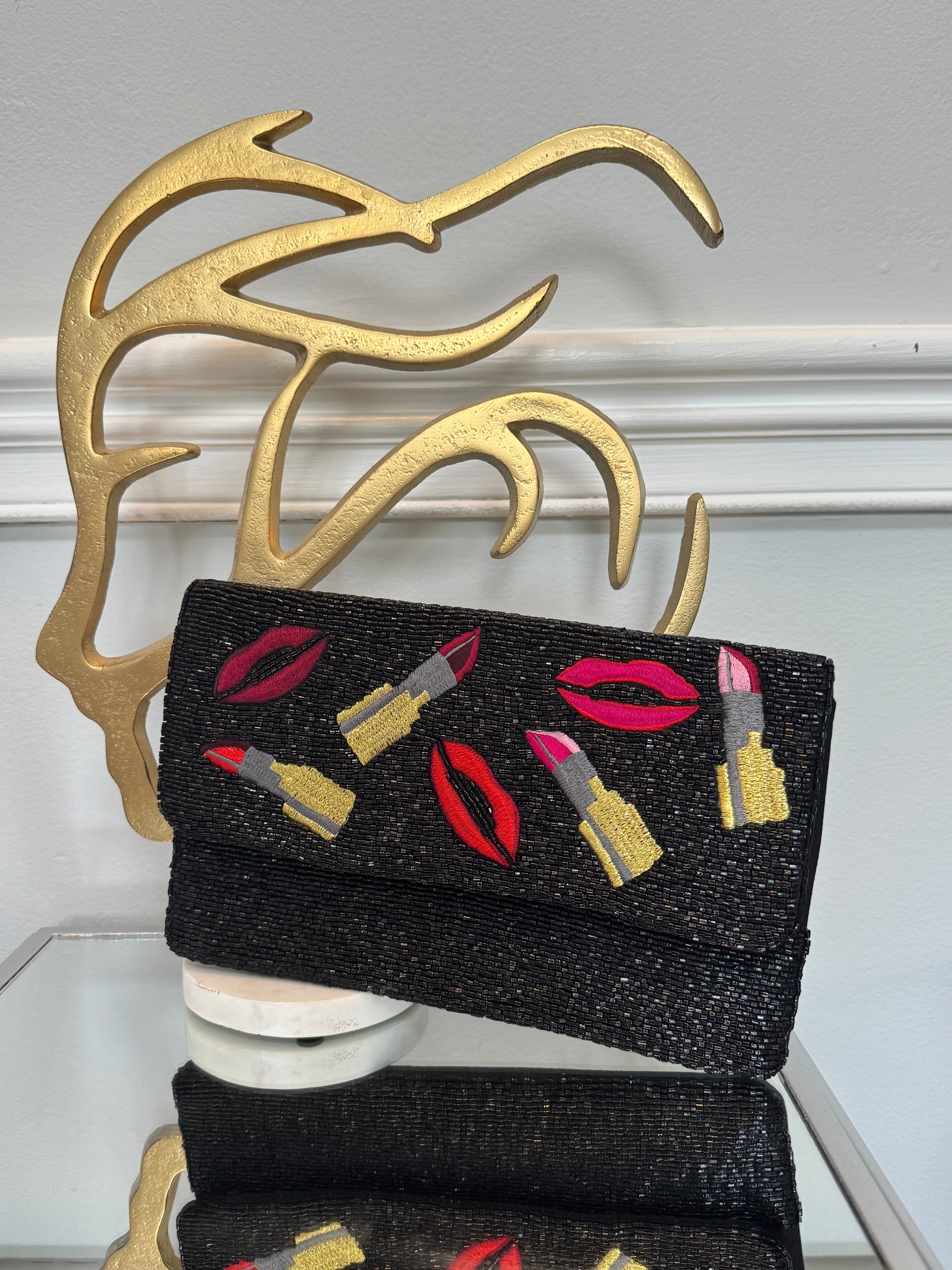 Black beaded & colored embroidery design clutch.