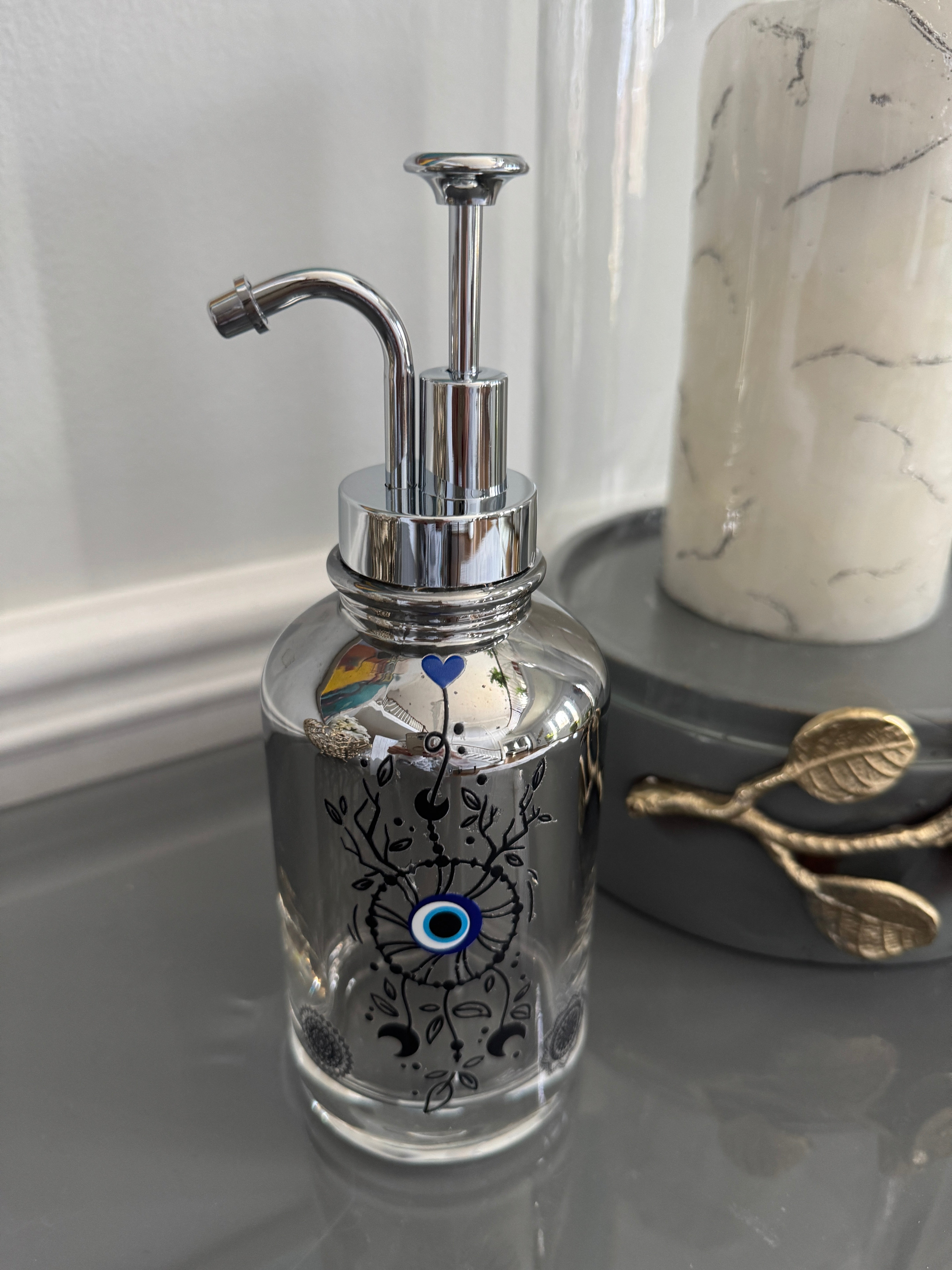 Clear Grayish Glass & Silver Soap Dispenser designed with evil eye 🧿 motif.