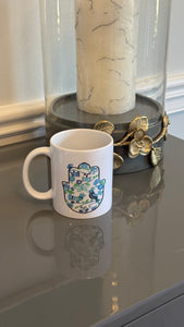 White Mug designed with colorful blue & teal color Fatimah's Hand