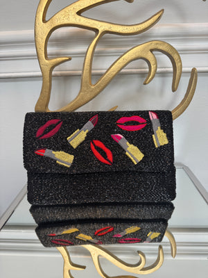 Black beaded & colored embroidery design clutch.