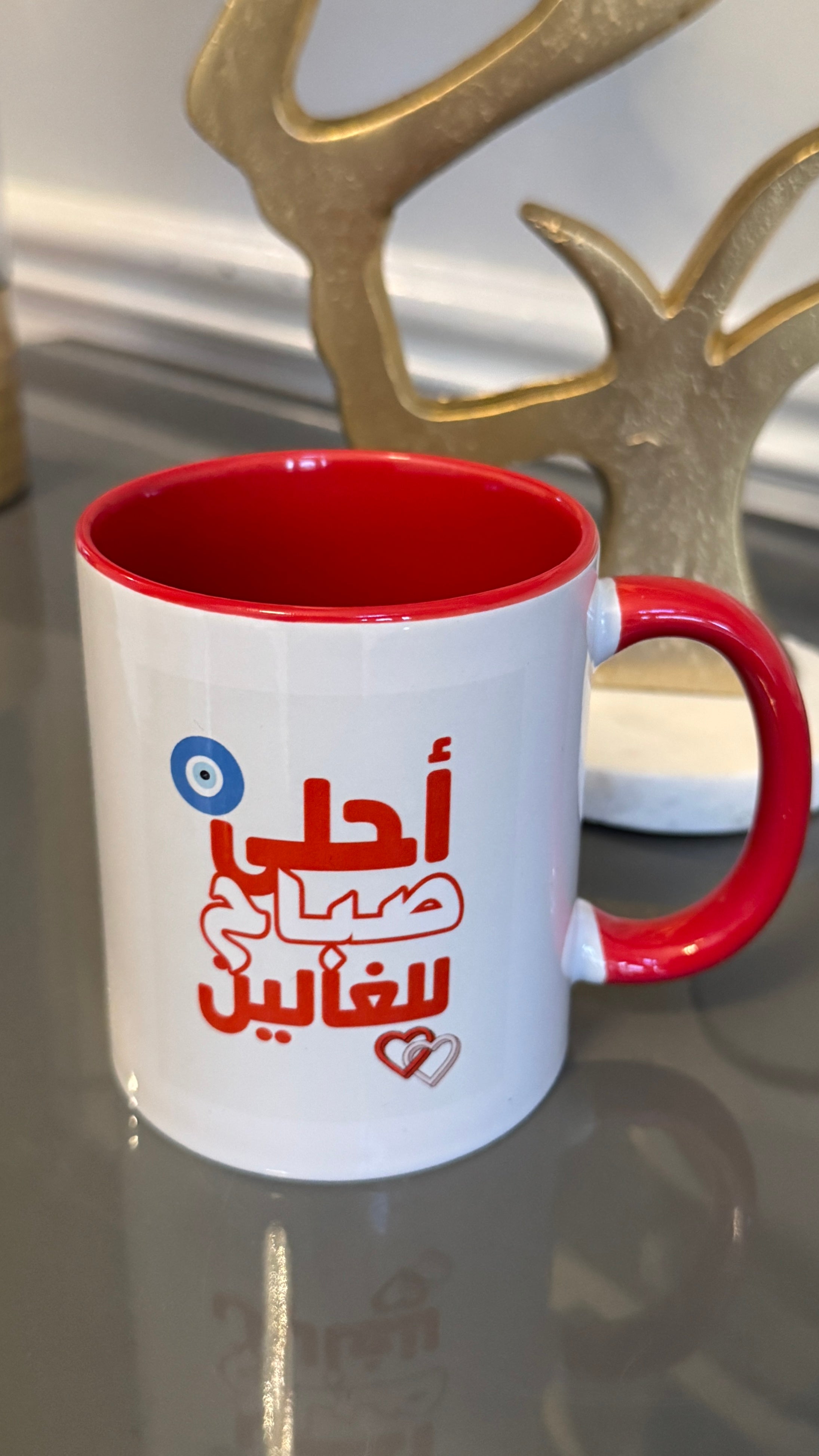 White Mug designed with vibrant morning greetings احلى صباح للغالين