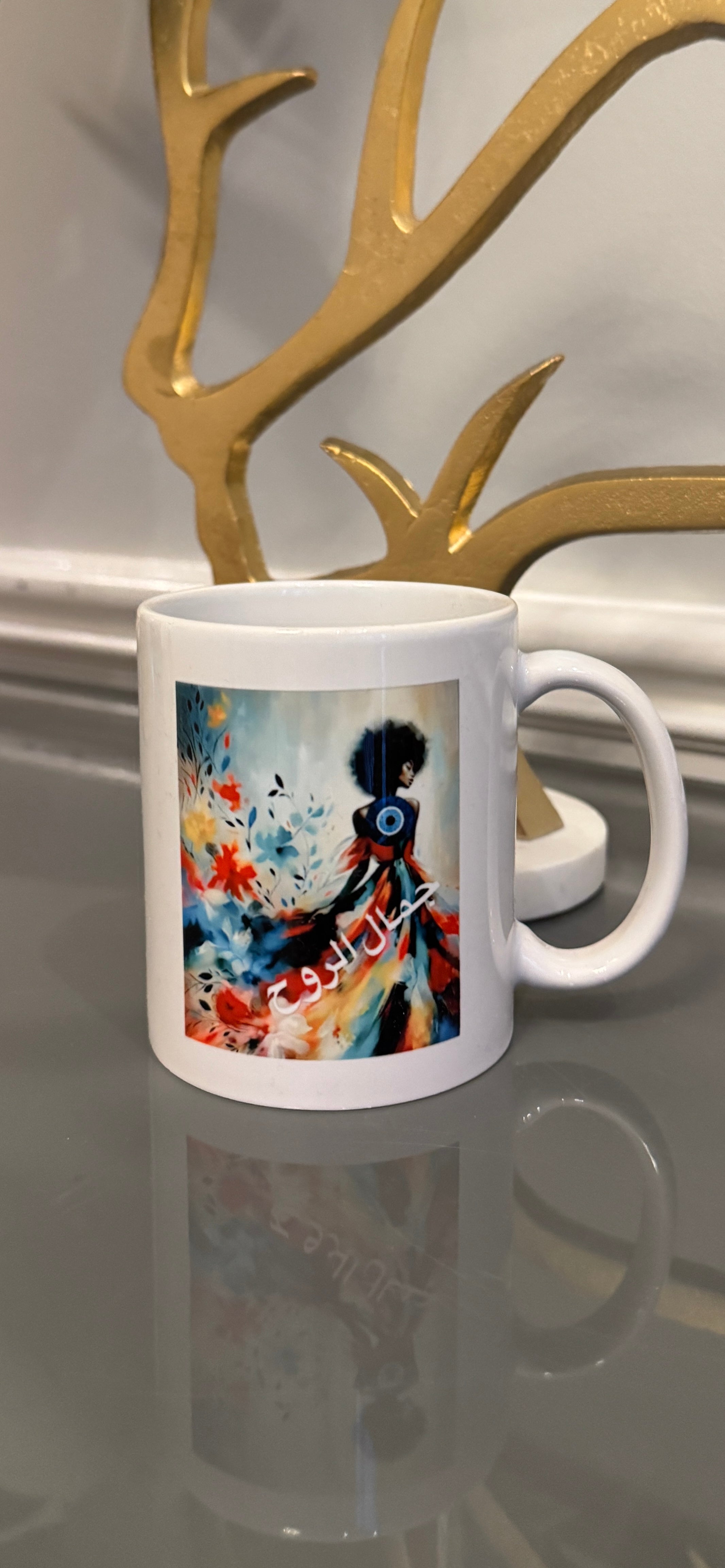 White mug designed with a powerful women image, evil eye and Arabic Caligraphy جمال الروح