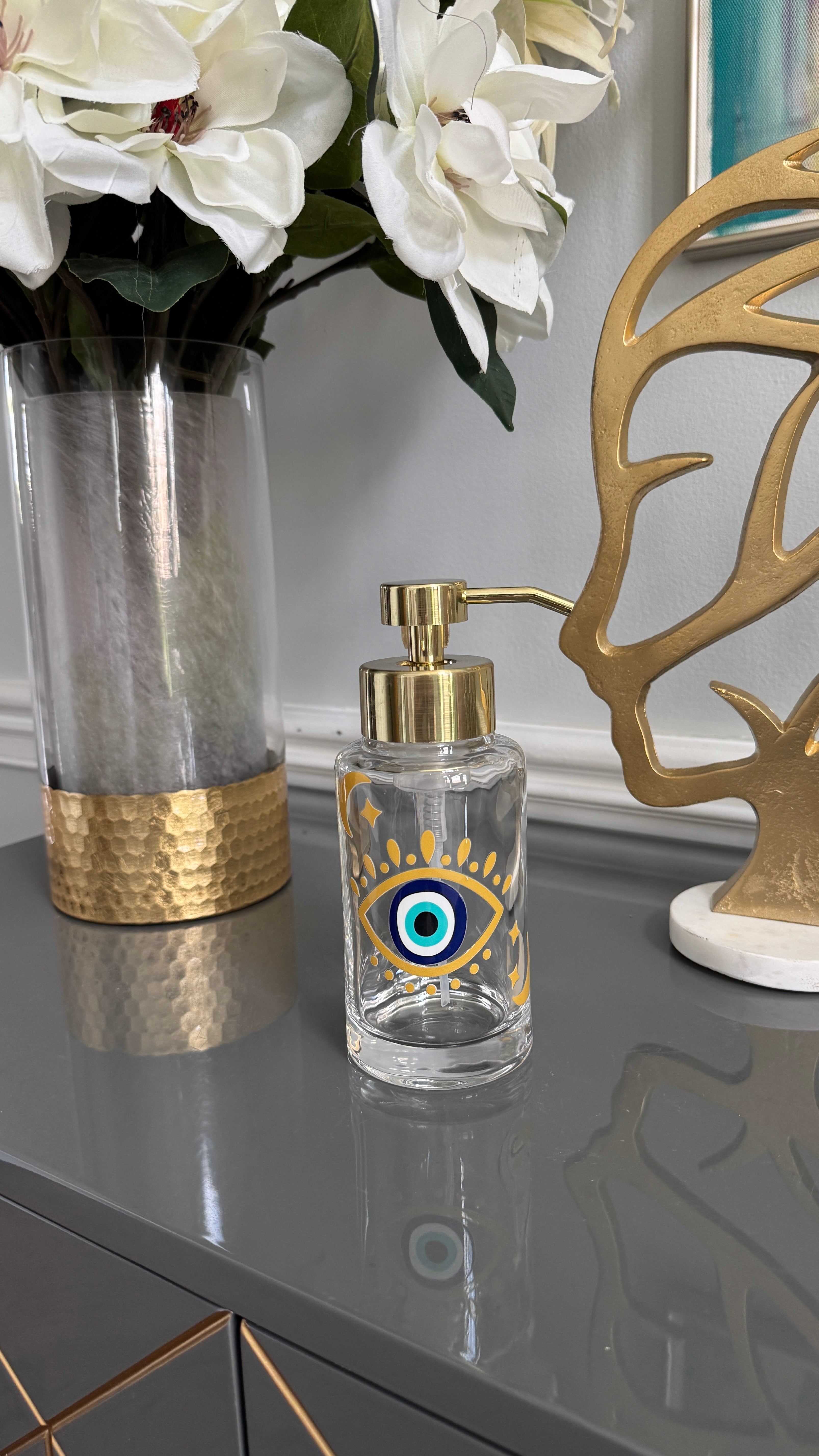 Clear Glass & Gold Soap Dispenser designed with evil eye 🧿 motif.