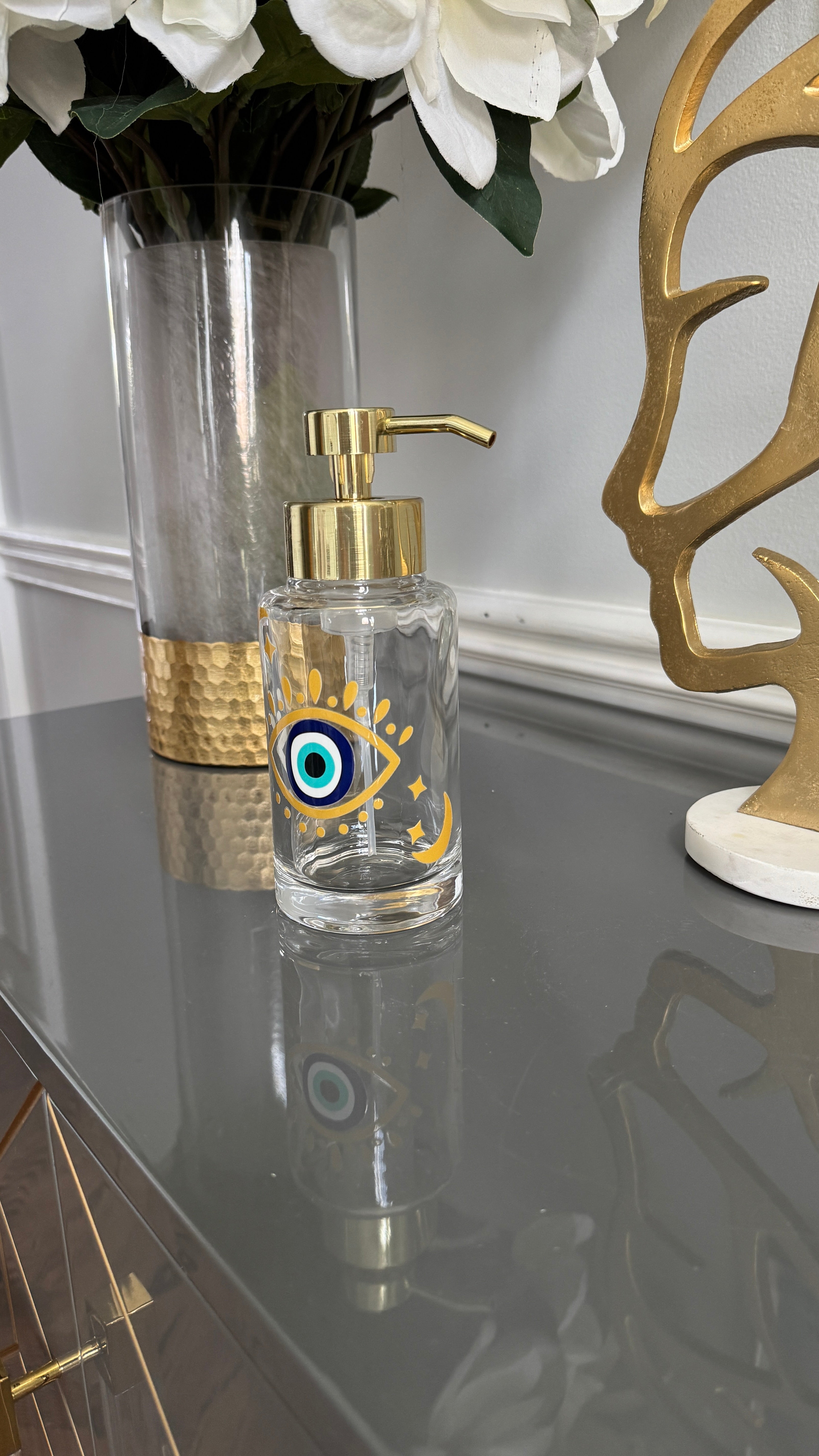 Clear Glass & Gold Soap Dispenser designed with evil eye 🧿 motif.