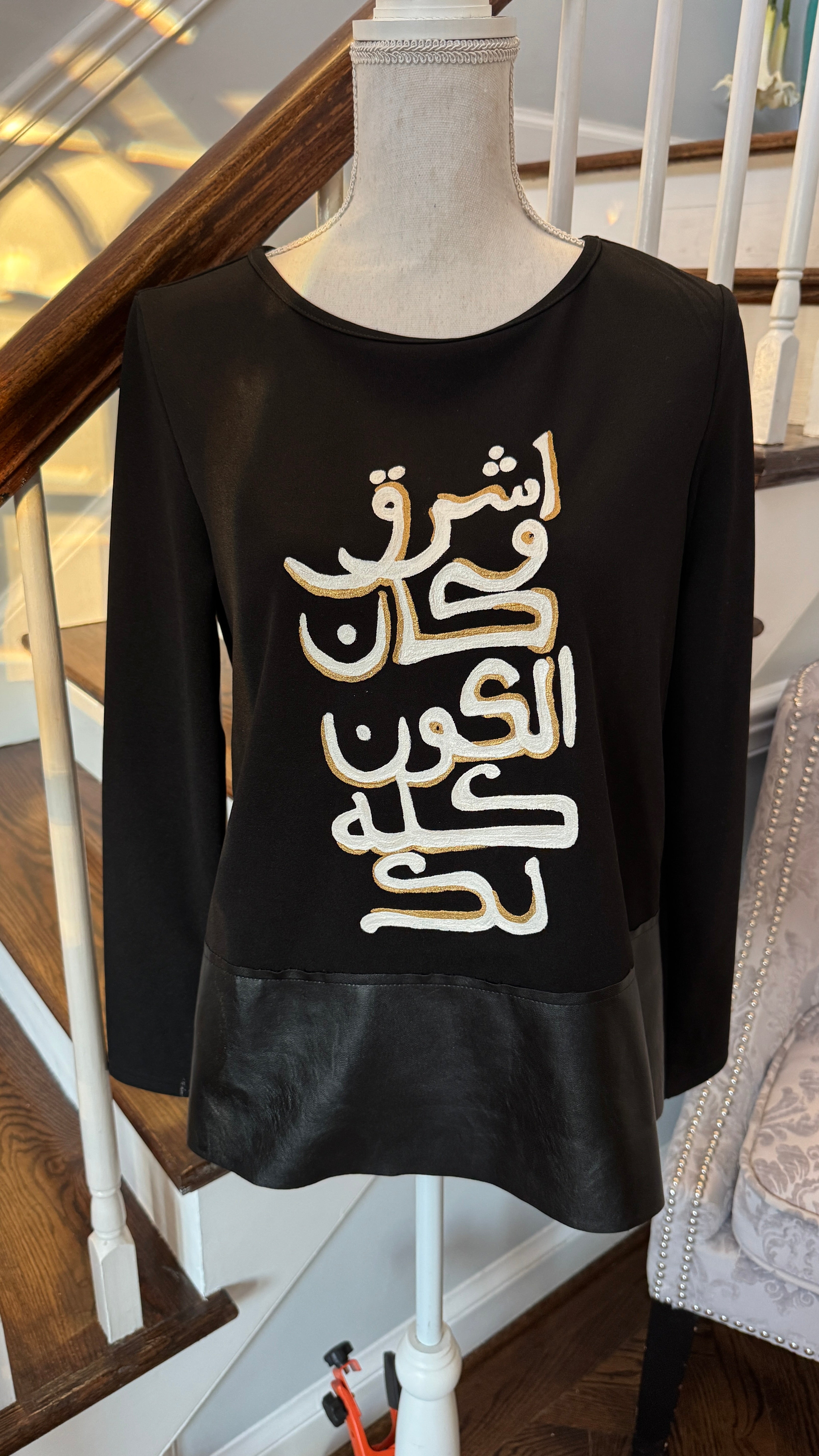 Long sleeve black top, hand painted Arabic Caligraphy design اشرق وكأن الكون كله لك