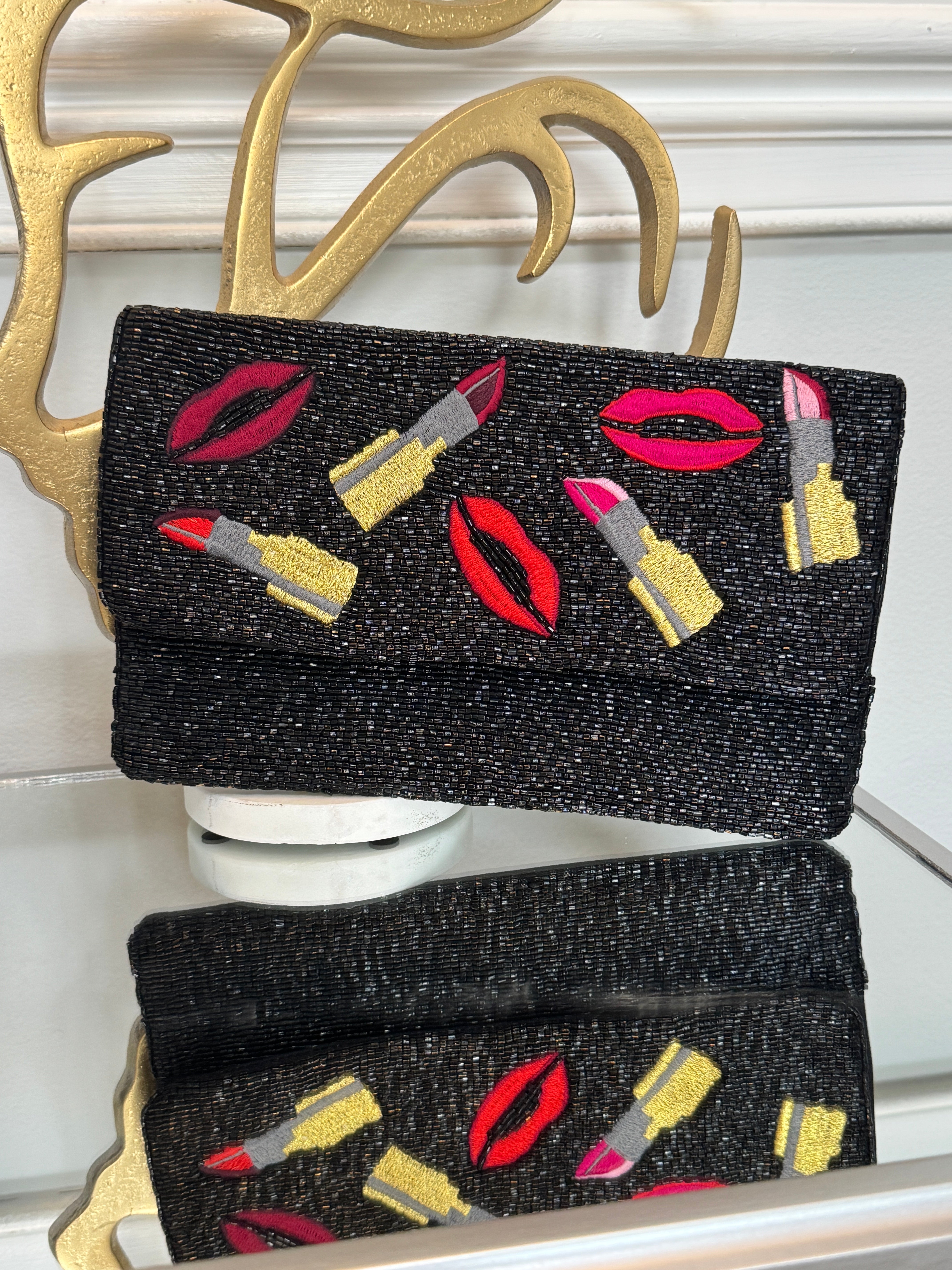 Black beaded & colored embroidery design clutch.