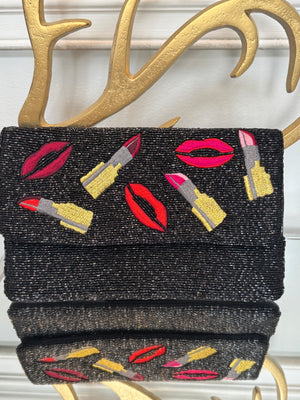 Black beaded & colored embroidery design clutch.