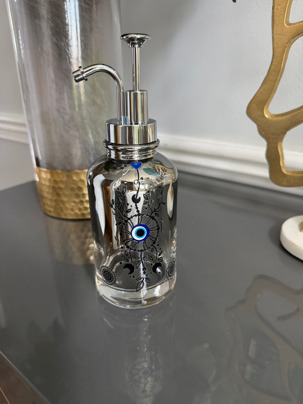 Clear Grayish Glass & Silver Soap Dispenser designed with evil eye 🧿 motif.