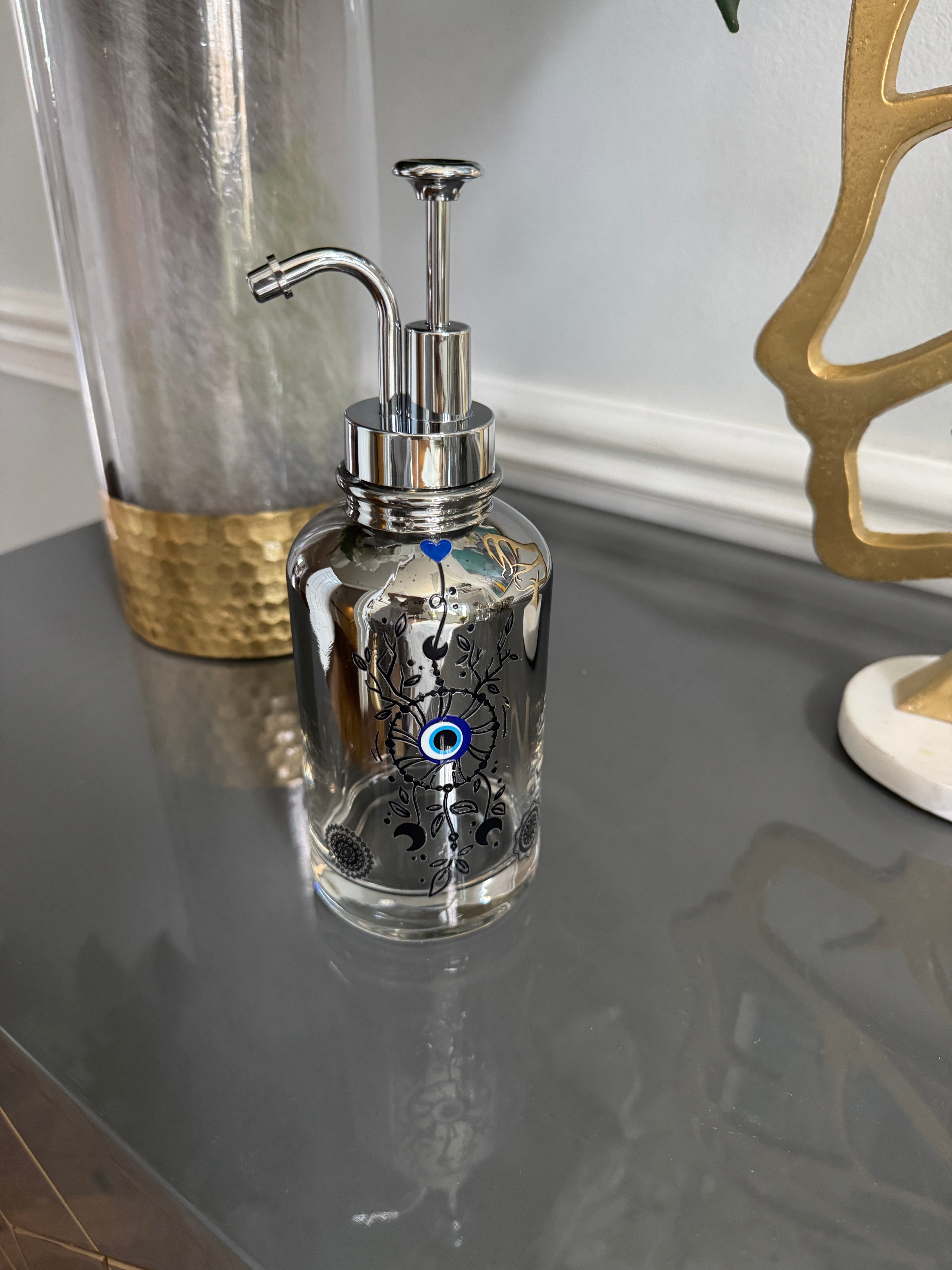 Clear Grayish Glass & Silver Soap Dispenser designed with evil eye 🧿 motif.