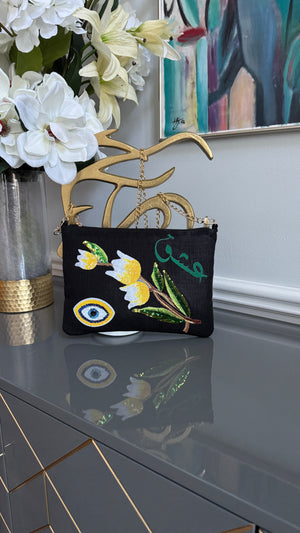 Black clutch with sequins flowers & Yellow Arabic Caligraphy عشق and evil eye design