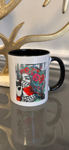 White mug designed with a powerful women image wearing the keffiyeh.