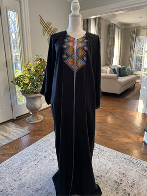 Black Open caftan embroidery design on the front. Designed with fun Arabic Calligraphy Unique design on the back. عليك عين، عندك سفرة، شايفي عريس