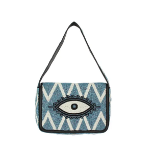 Beaded evil eye shoulder handbag with evil eye design and beaded handles.