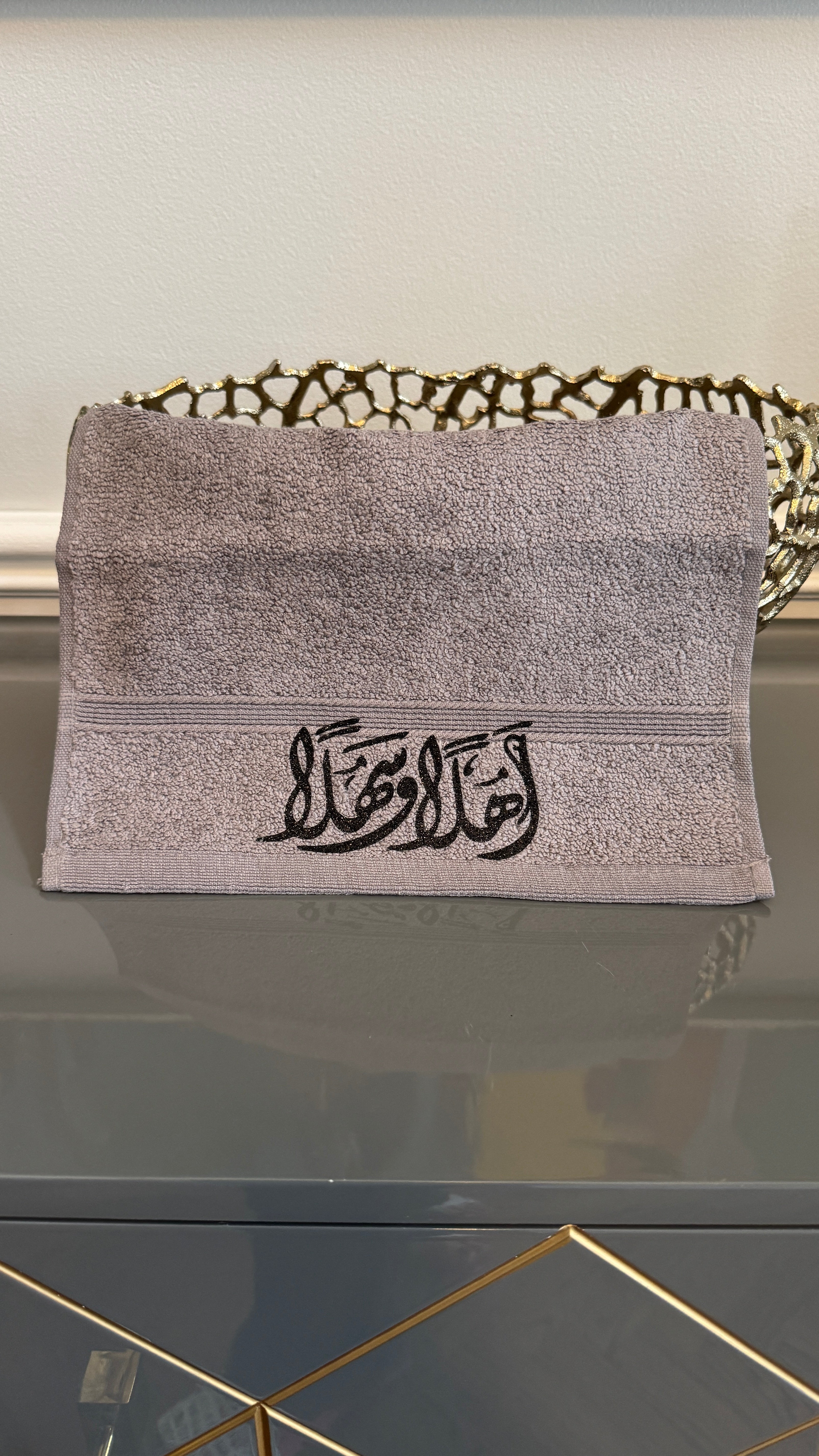 Gray Hand towel designed with Arabic Calligraphy اهلا وسهلاً