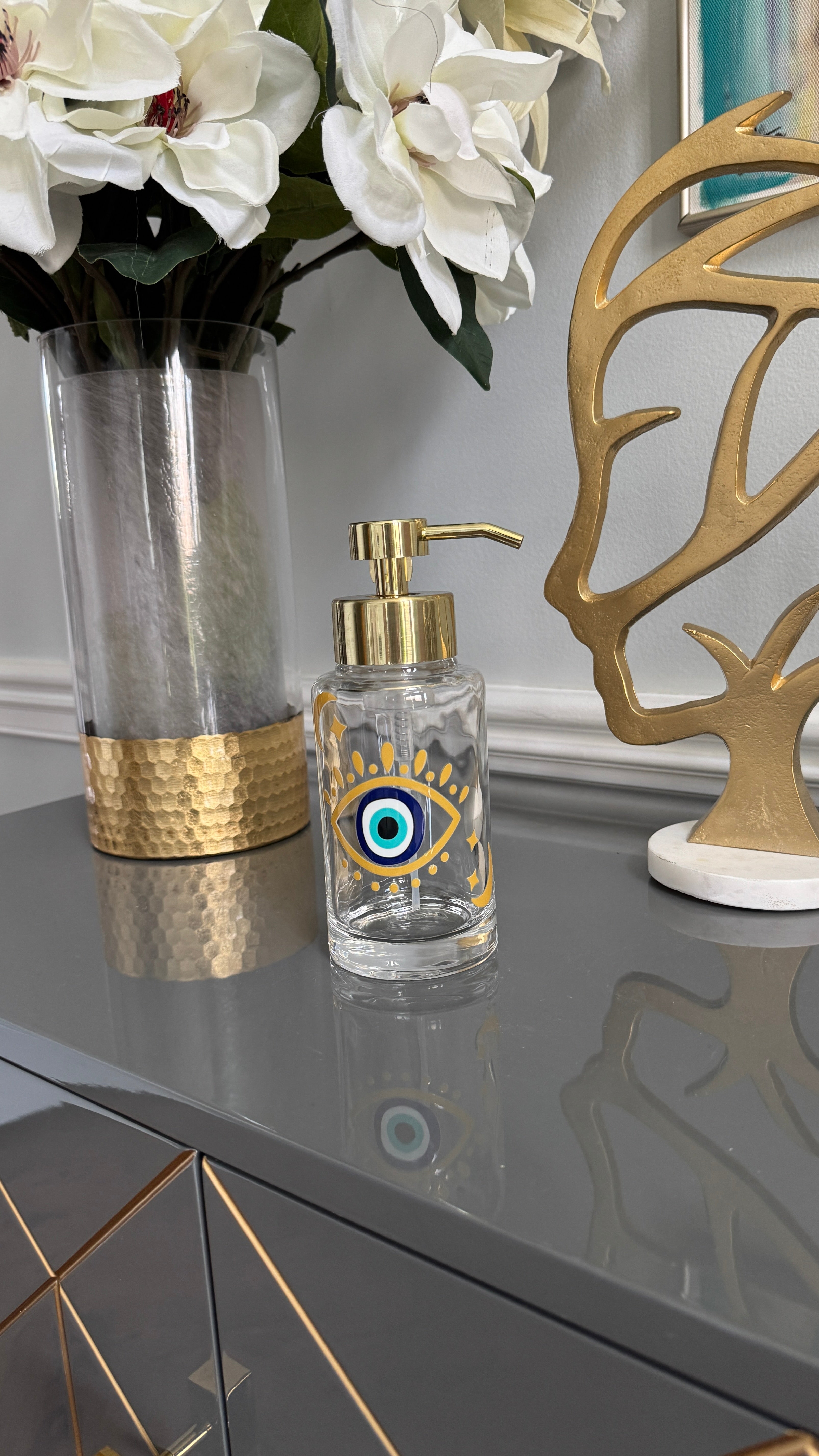 Clear Glass & Gold Soap Dispenser designed with evil eye 🧿 motif.