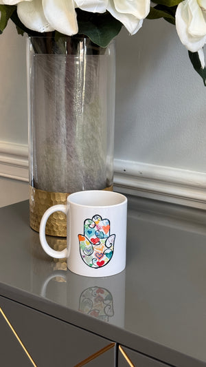 White Mug designed with colorful Fatimah's Hand