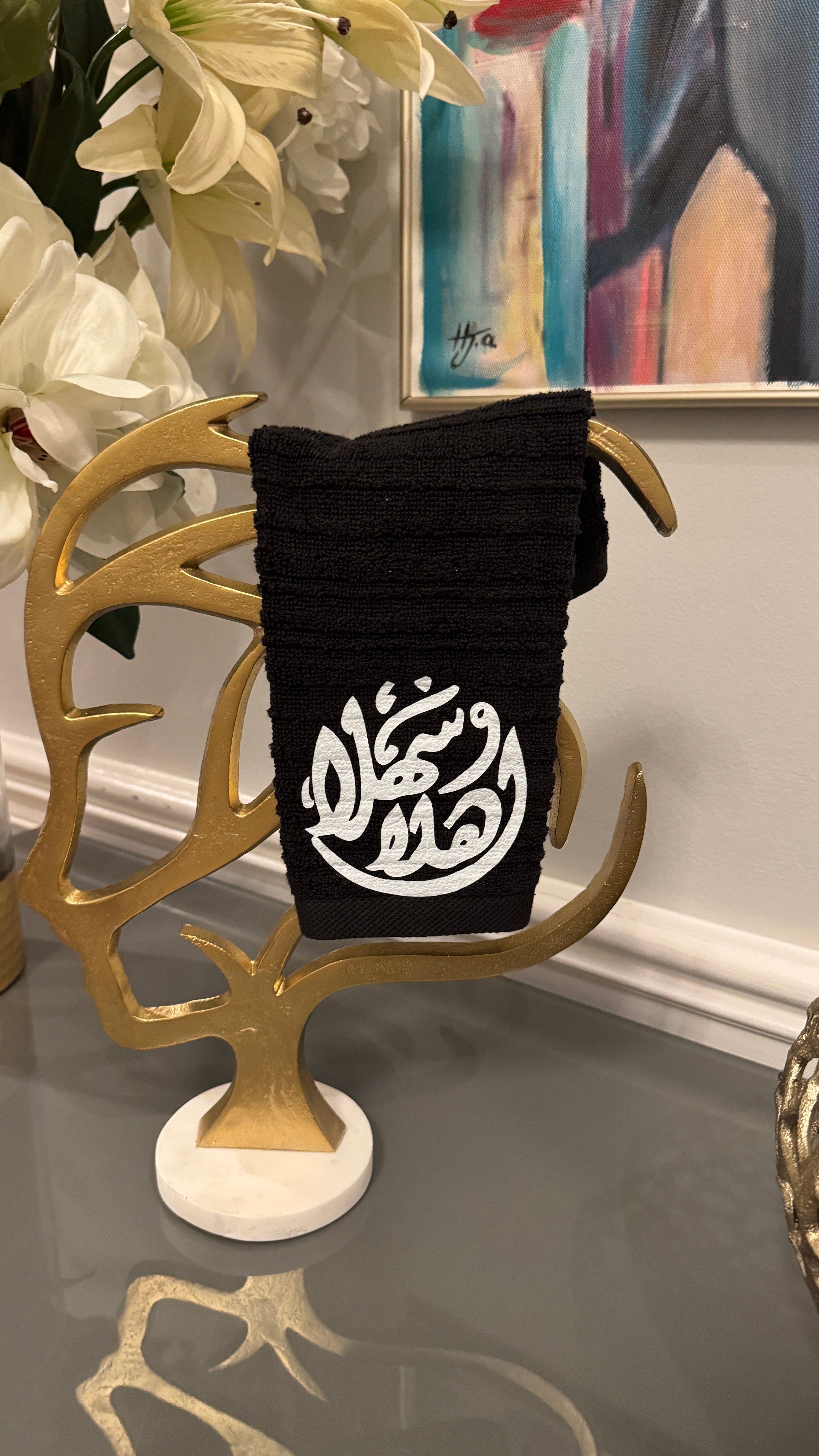 Black hand towel designed with Arabic Calligraphy اهلاً وسهلاً