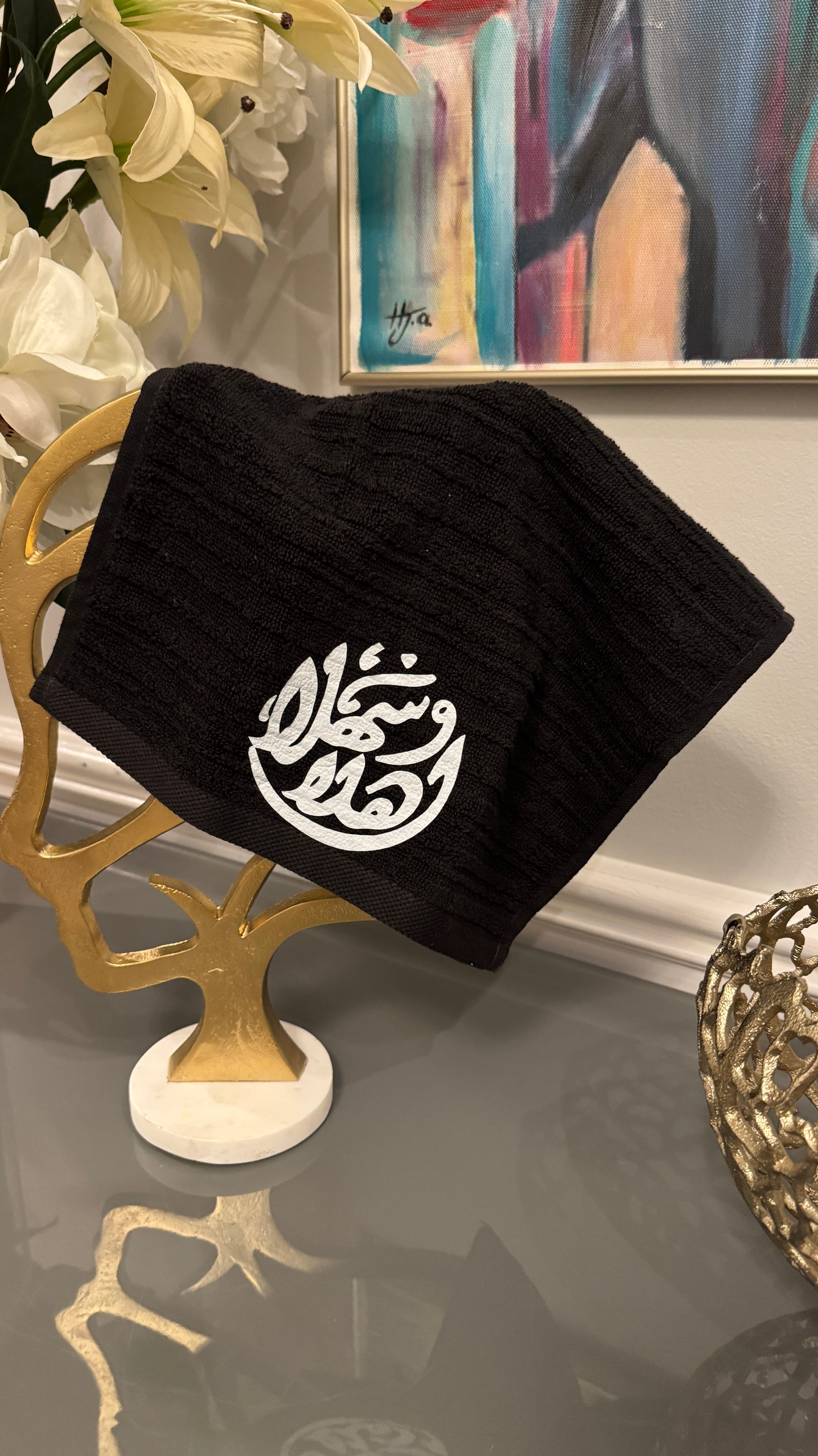 Black hand towel designed with Arabic Calligraphy اهلاً وسهلاً