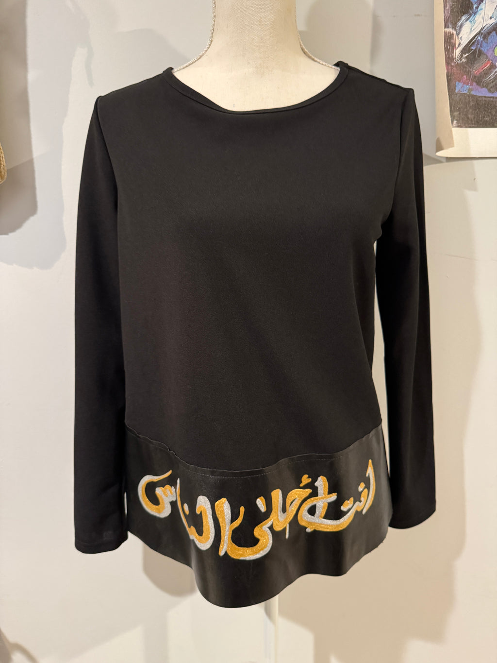 Long sleeve black top, hand painted Arabic Caligraphy design انت احلى الناس