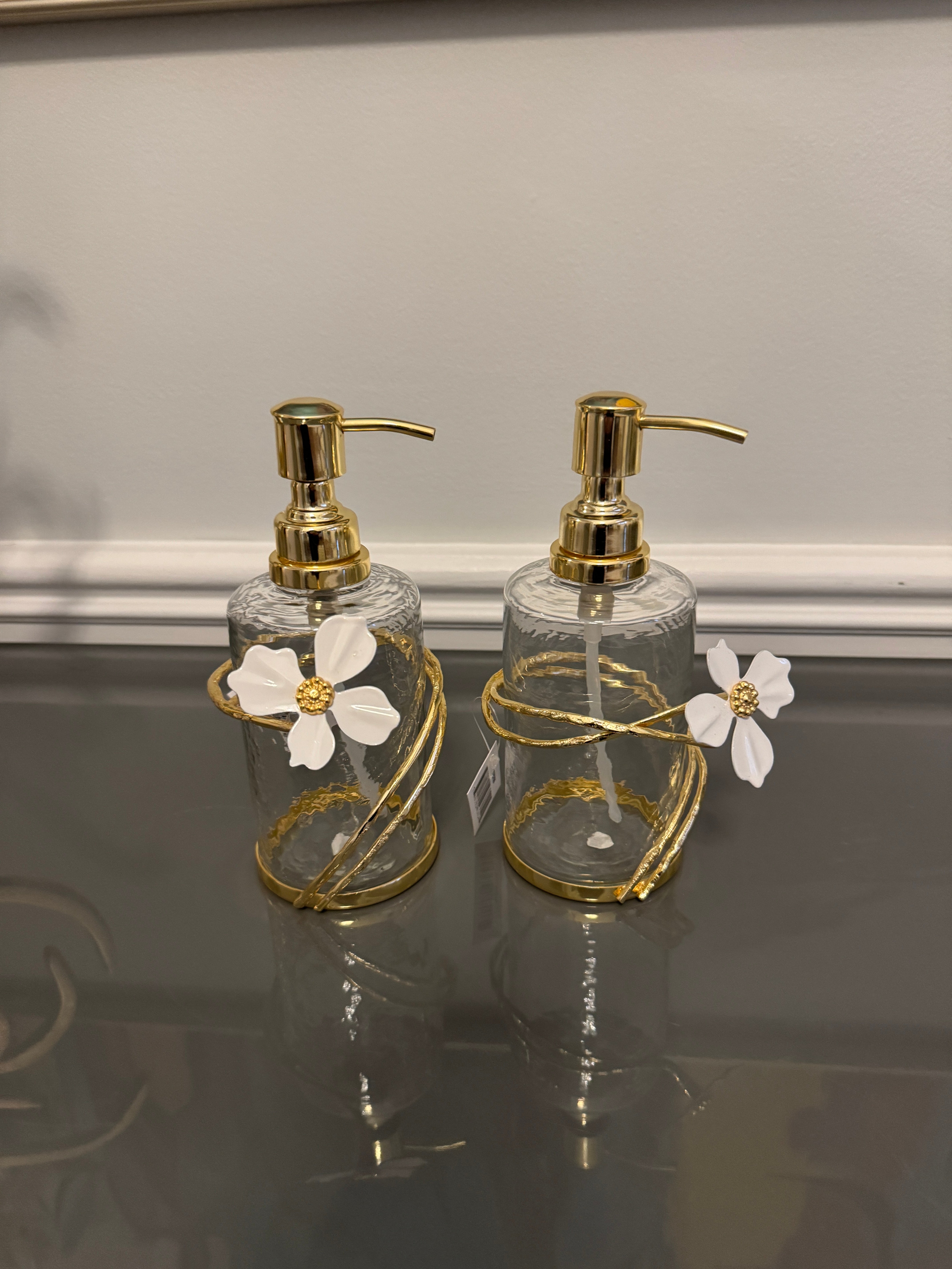 Soap and Lotion Dispenser with Gold Jewel Flower Design.