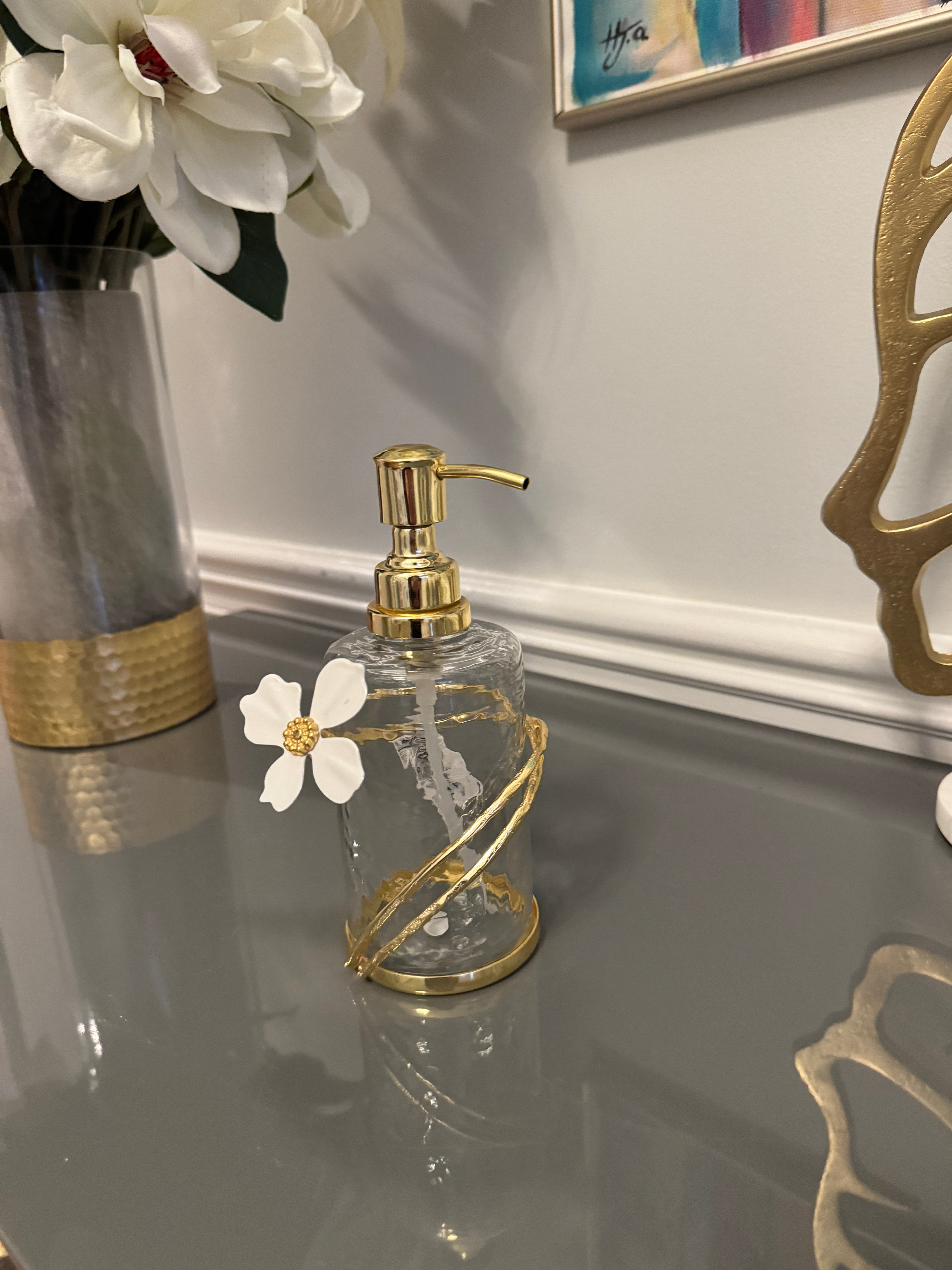 Soap and Lotion Dispenser with Gold Jewel Flower Design.