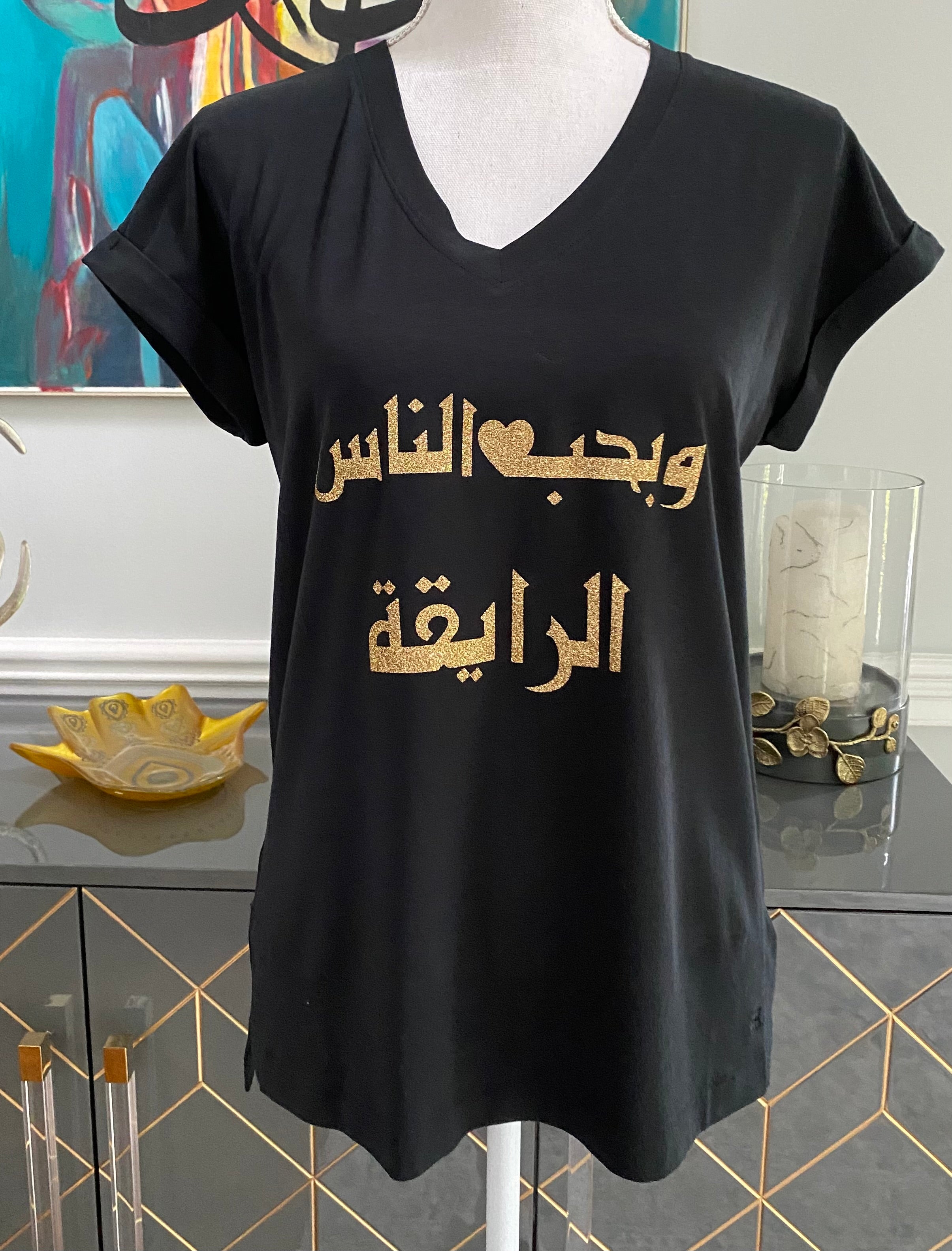 Black v-neck top with Arabic calligraphy Design