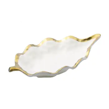 White and gold leaf shaped dish